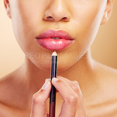 Buy stock photo Mouth, woman or closeup of lip pencil for makeup, facial skincare or beauty cosmetics in studio. Hand, model or person with lipstick product to outline lips, aesthetic makeover and color application
