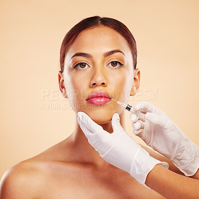 Buy stock photo Filler, plastic surgery and face of woman with beauty treatment for isolated in brown studio background. Skincare, cosmetics and portrait of person with syringe for facial or medical transformation