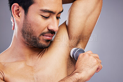 Buy stock photo Man, deodorant and clean armpit with hygiene, routine and control sweat with beauty product on studio background. Antiperspirant, skin and underarm smell, scent or skincare perfume or cosmetics 