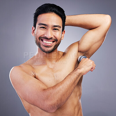 Buy stock photo Portrait, man and deodorant on clean armpit for hygiene, routine and control of sweat with beauty product on studio background. Antiperspirant, skin or smell, scent and skincare perfume or cosmetics 