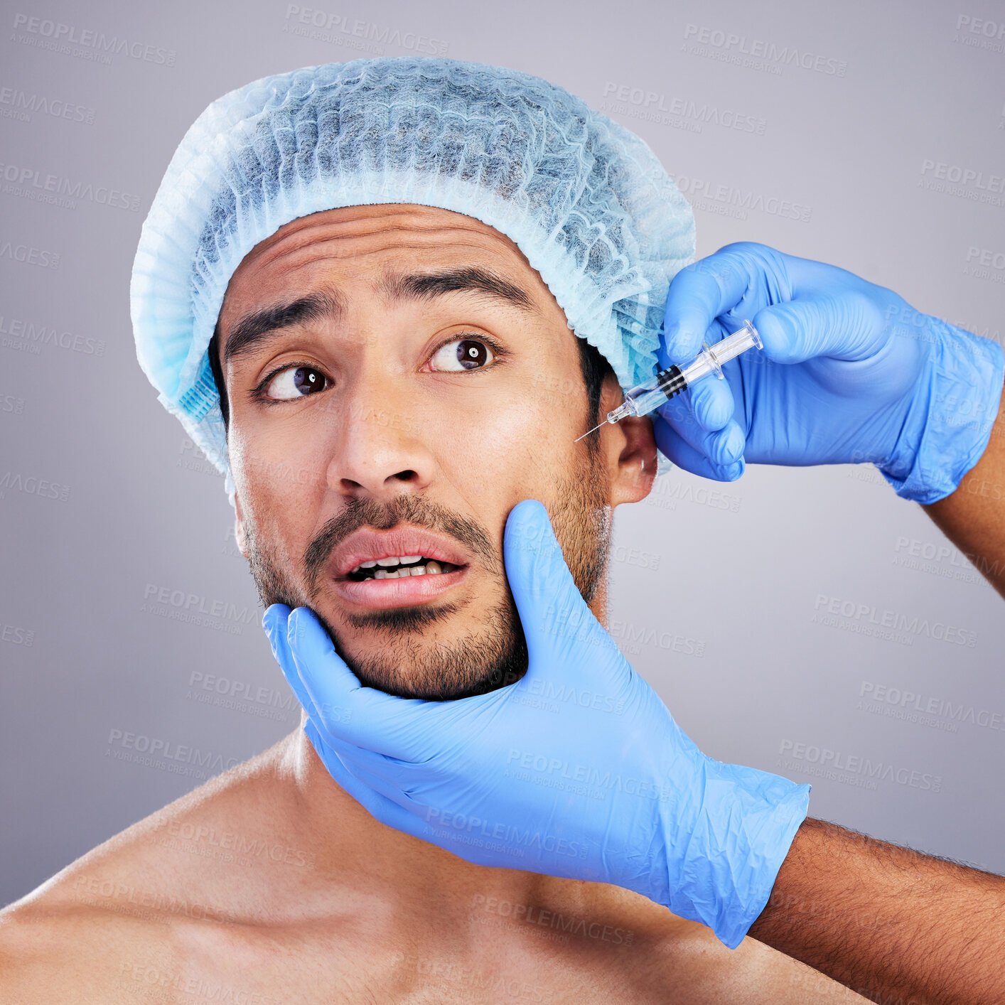 Buy stock photo Scared, man or plastic surgery injection for facelift or cosmetics isolated in studio on white background. Hands, fear or worried Asian male person with needle for skin beauty in medical procedure