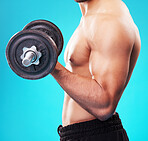 Weightlifting, fitness and person doing health training, exercise or workout isolated in studio blue background. Bodybuilder, wellness and young man with dumbbell for body or bicep strength endurance