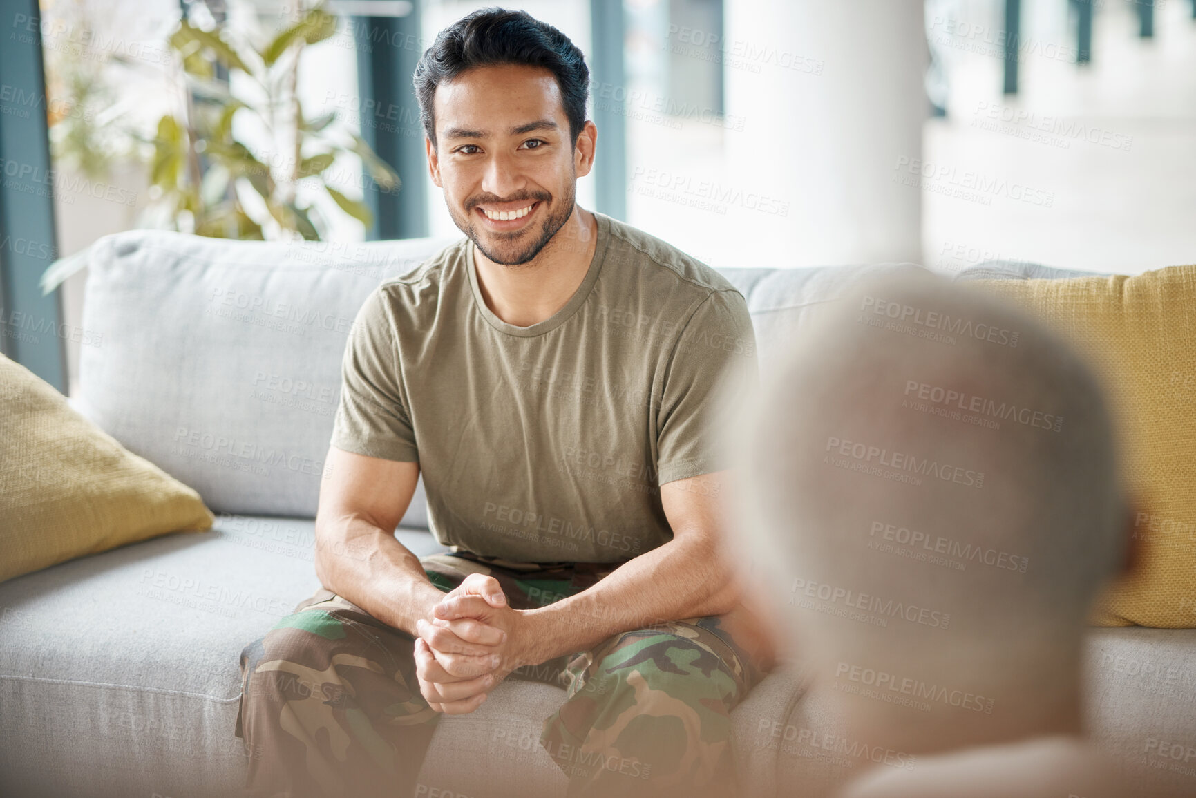 Buy stock photo Smile, soldier and man with psychologist for therapy, consultation and military communication. Happy, army veteran and counselling with therapist for mental health, help or support on sofa in office