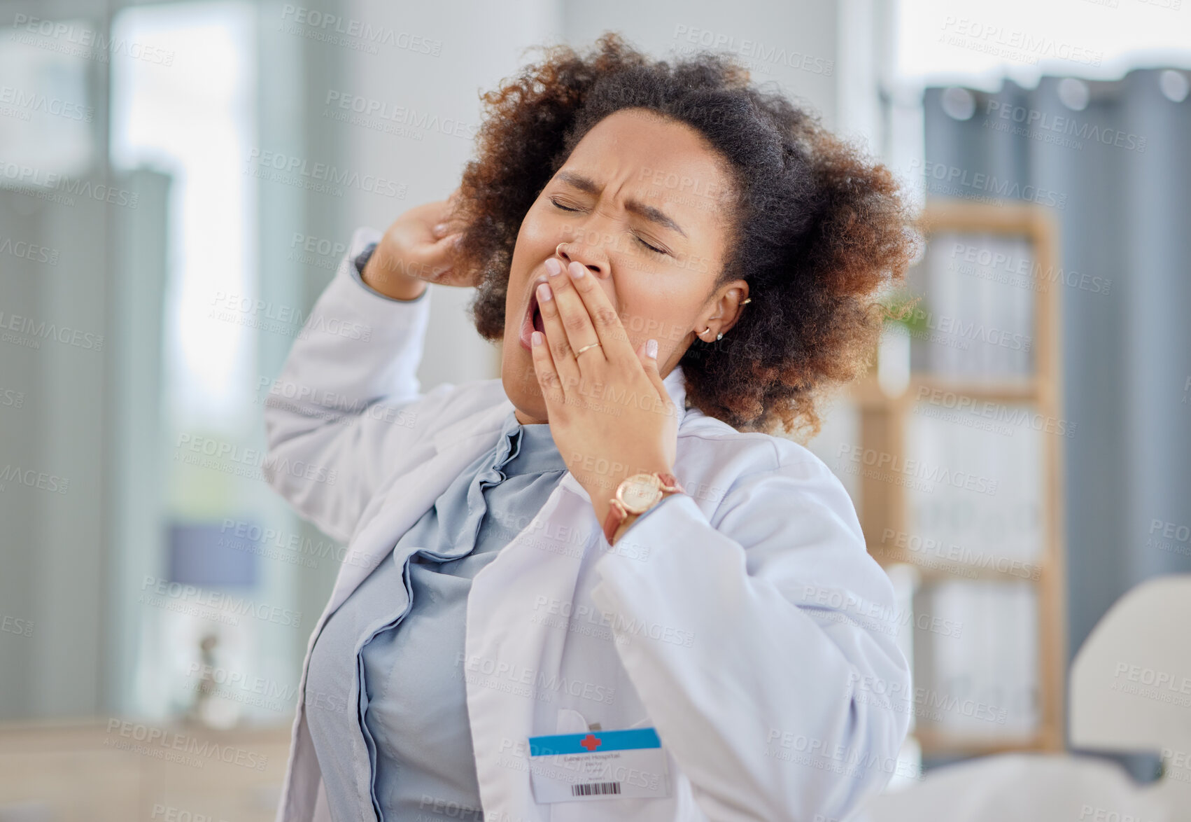 Buy stock photo Tired doctor, woman and yawn in hospital with burnout, medical stress and working with low energy in clinic. Fatigue of black female healthcare worker yawning while feeling overworked, sleepy or lazy