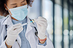 Healthcare, black woman or a doctor with a vaccine for a virus, health medicine or getting ready. Face mask, safety and an African nurse or surgeon with a vial and syringe for nursing at a clinic