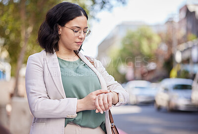 Buy stock photo Time check, travel and a woman in the city for an appointment, early commute and reading notification. Morning, working and a young female employee with a watch for a schedule or agenda in the road