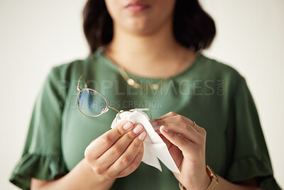 Buy stock photo Woman, hands and clean the dust on glasses for heathy vision with cloth for protection. Eye, care and wipe spectacles with tissue for sight or reading with maintenance for frames or wellness or dirt.