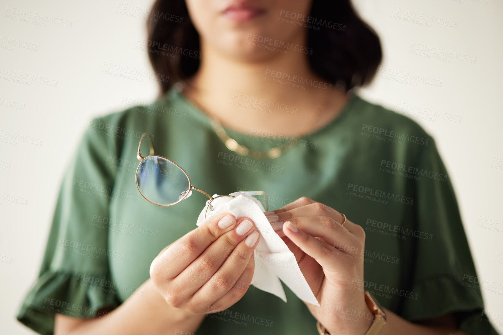 Buy stock photo Woman, hands and clean the dust on glasses for heathy vision with cloth for protection. Eye, care and wipe spectacles with tissue for sight or reading with maintenance for frames or wellness or dirt.