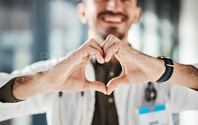 Buy stock photo Hospital doctor, happy man and closeup heart hands for surgeon healthcare, medical services and cardiology health. Medicine satisfaction, emoji love icon and clinic person with nursing wellness care