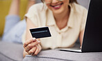 Hands of woman, credit card and ecommerce on laptop in home for digital payment, fintech password and online shopping. Closeup of customer, computer and banking code for financial investment account