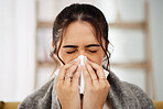 Tissue, nose and sick woman sneezing in living room with allergy, cold or flu in her home. Hay fever, sinusitis and female with viral infection, problem or health crisis in lounge with congestion 
