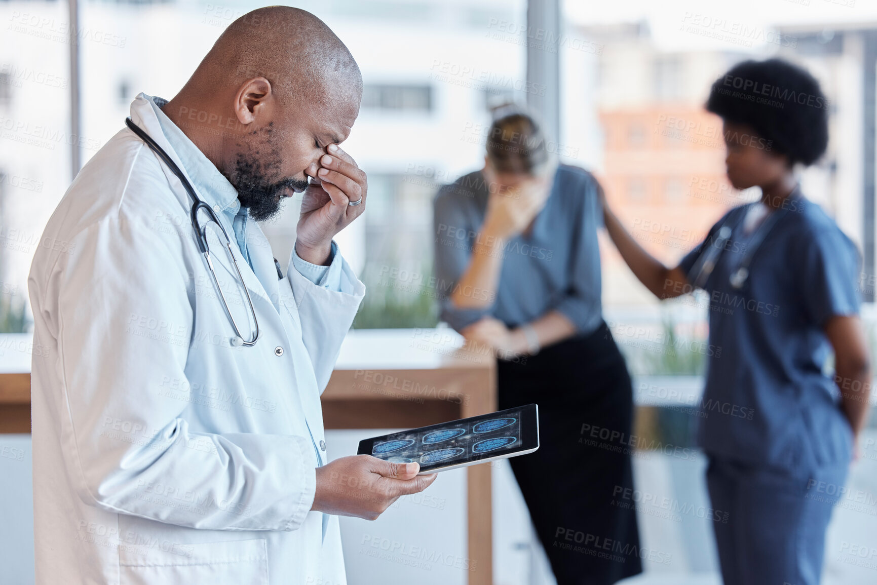 Buy stock photo Surgeon, man and medical error or frustrated at hospital with tablet or bad news for patient. Mistake, doctor and technology with results or scan with error by healthcare worker with crises or xrray.