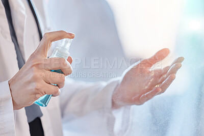 Buy stock photo Sanitizer, cleaning and hands of doctor with protection from bacteria or hygiene against virus at the workplace. Disease, closeup and professional medical employee or healthcare worker for wellness