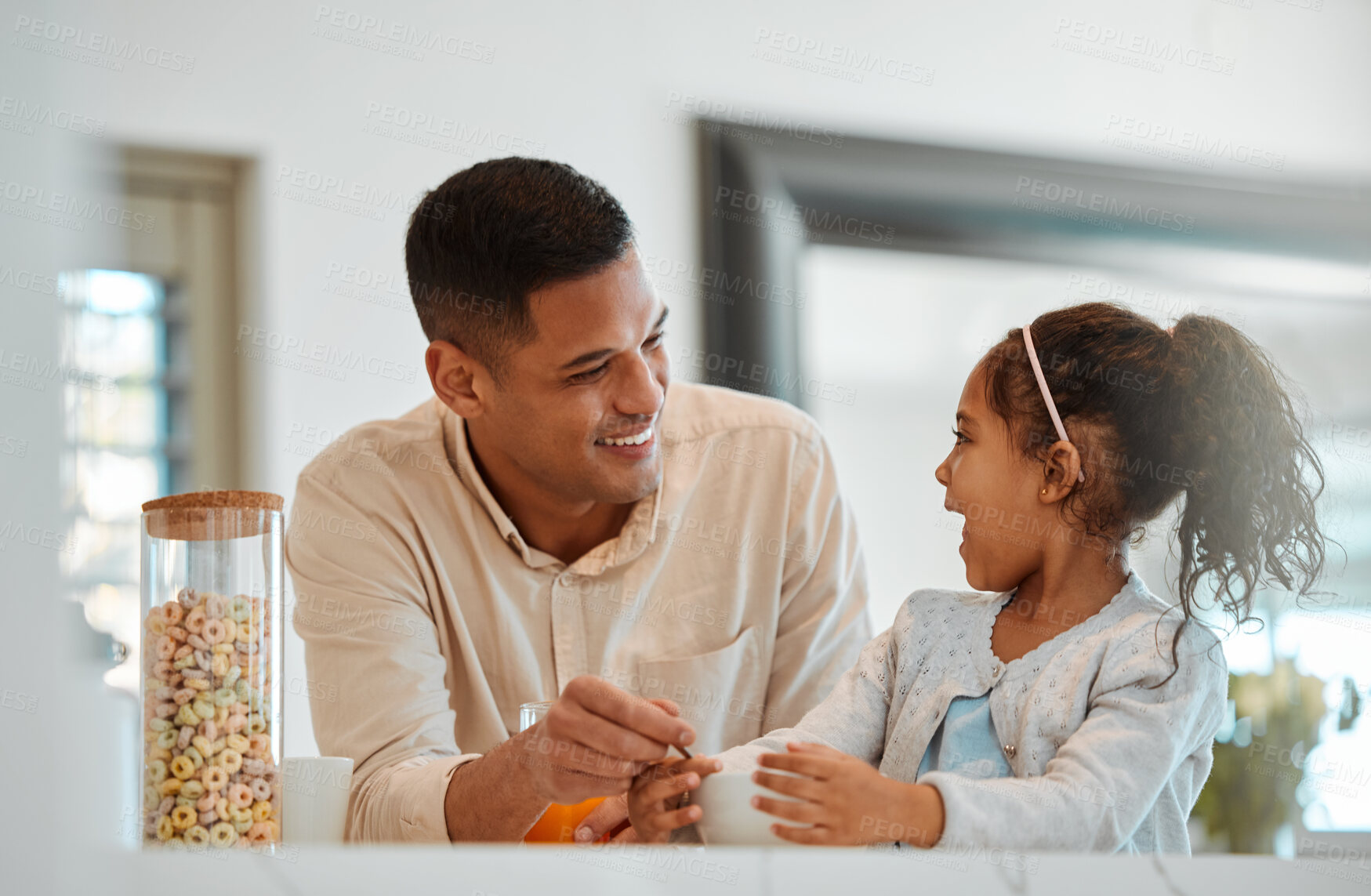 Buy stock photo Happy family, father and child eating breakfast and talking of school, growth development and health at home. Dad helping kid or girl with cereal or morning food and funny conversation in kitchen 