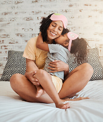 Buy stock photo Love, hug and mother with child on bed for bonding, quality time and affection in morning. Family home, happiness and mom embrace daughter after sleeping, dreaming and relax in bedroom together