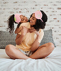 Bedroom, girl and mother with hug for love in home for bond with care together to relax. Happy, woman and kid with embrace in morning for quality time with child in apartment for affection or smile.