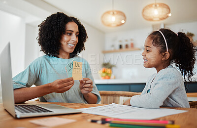 Buy stock photo Homework, alphabet card and mother with girl for learning, child development and teaching at home. Family, academic and happy mom with kid at table with letters for lesson, English and knowledge