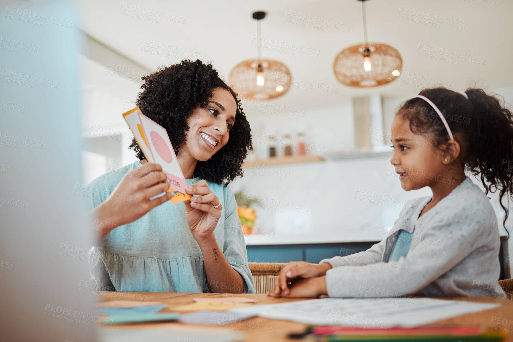 Buy stock photo Homework, learning and mother with girl with card for education, child development and studying. Family, school and happy mom with kid at table with paper for creative lesson, teaching and knowledge