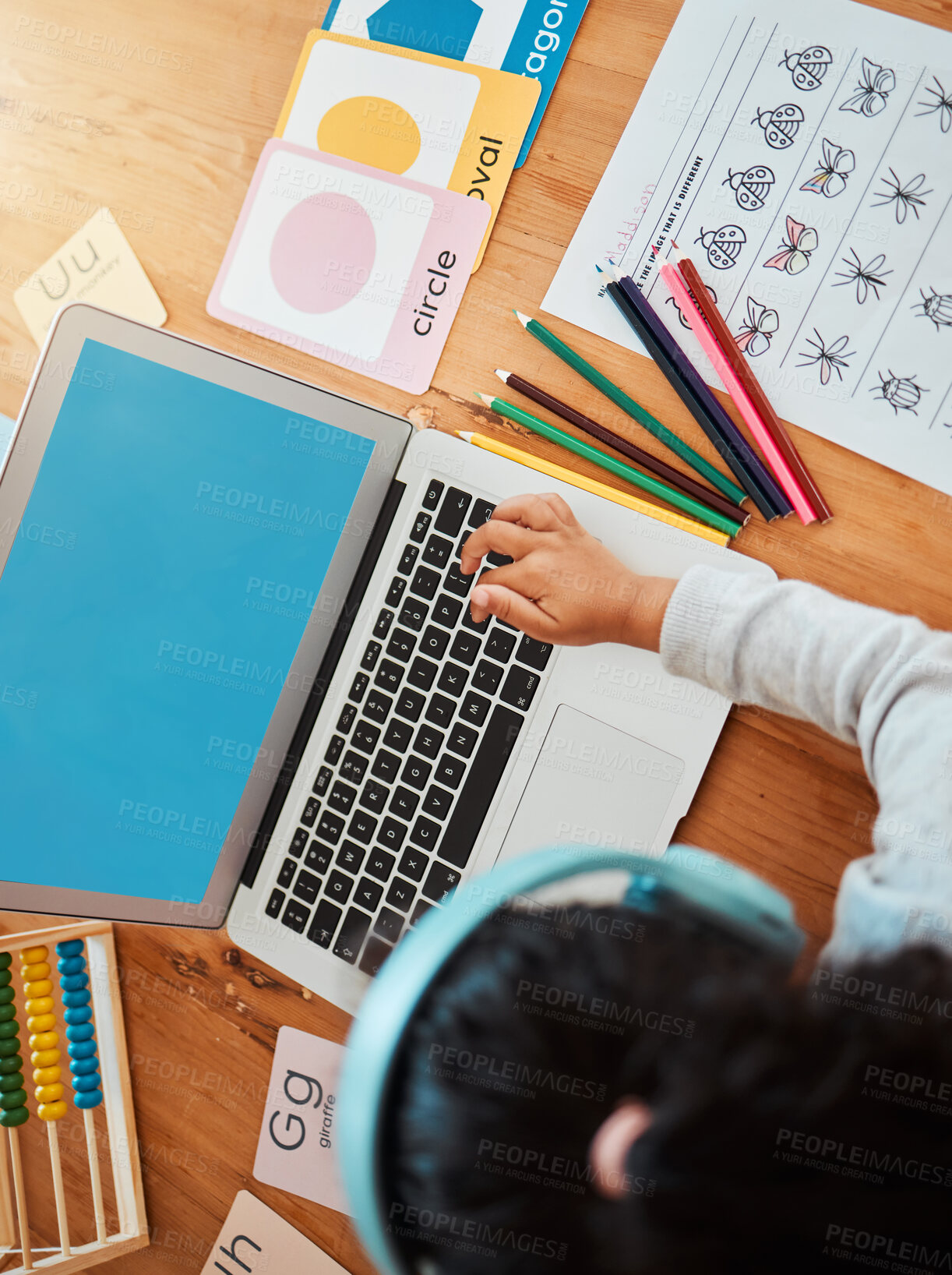 Buy stock photo Computer, girl and online learning at table in home for class, homework and development, growth and education. Kid, working on pc and studying for school, math and writing on paper in living room