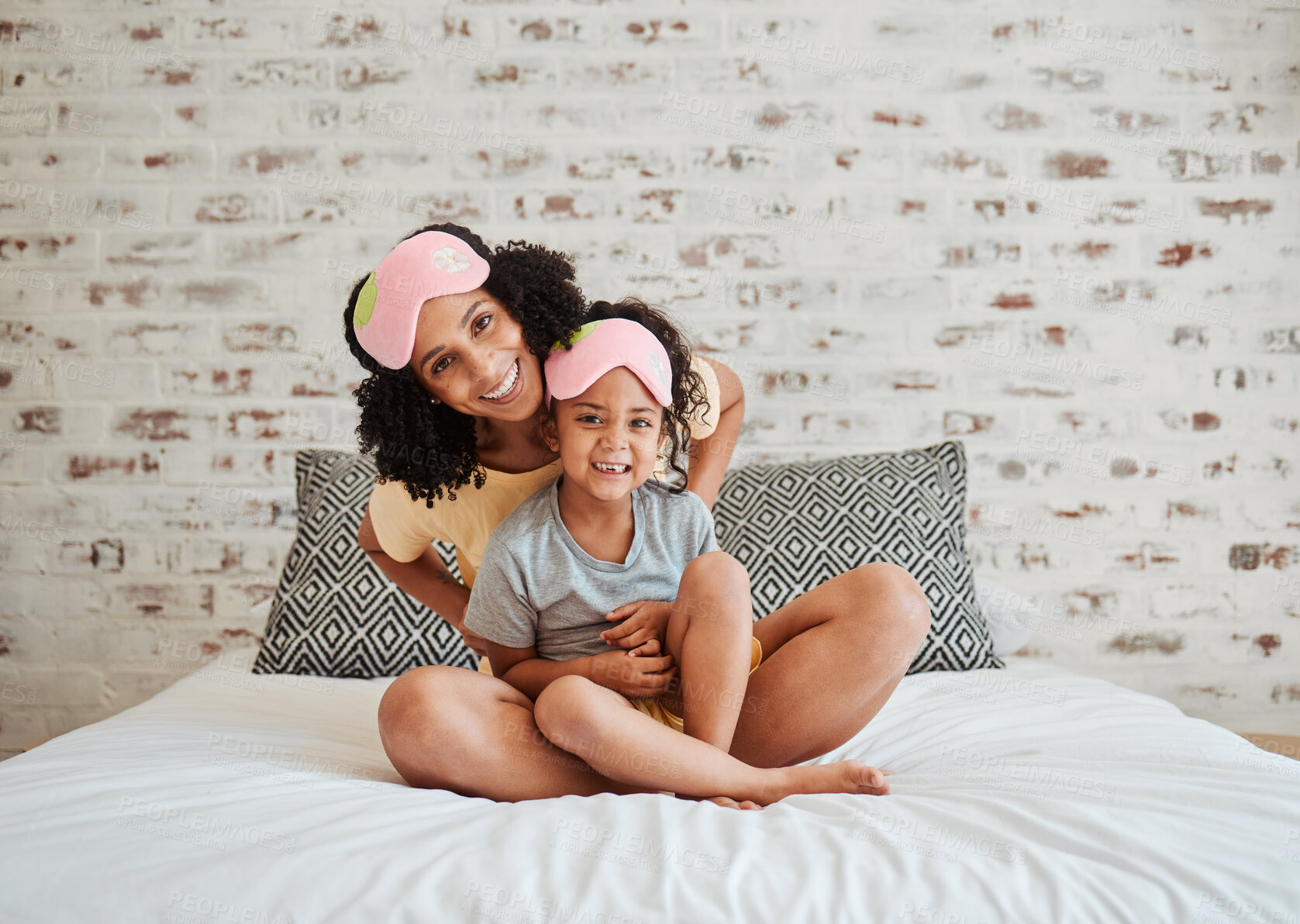 Buy stock photo Portrait, girl and mother with kid in bedroom for quality time in home to relax together with smile. Love, child and mother with happy face in morning for bond or care in apartment with support.