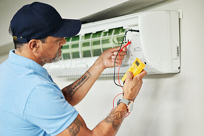 Buy stock photo Air conditioner, meter and electrician man for ac repair, maintenance and electrical power services on fan system. Person, technician or contractor with electricity, box check and hvac engineering