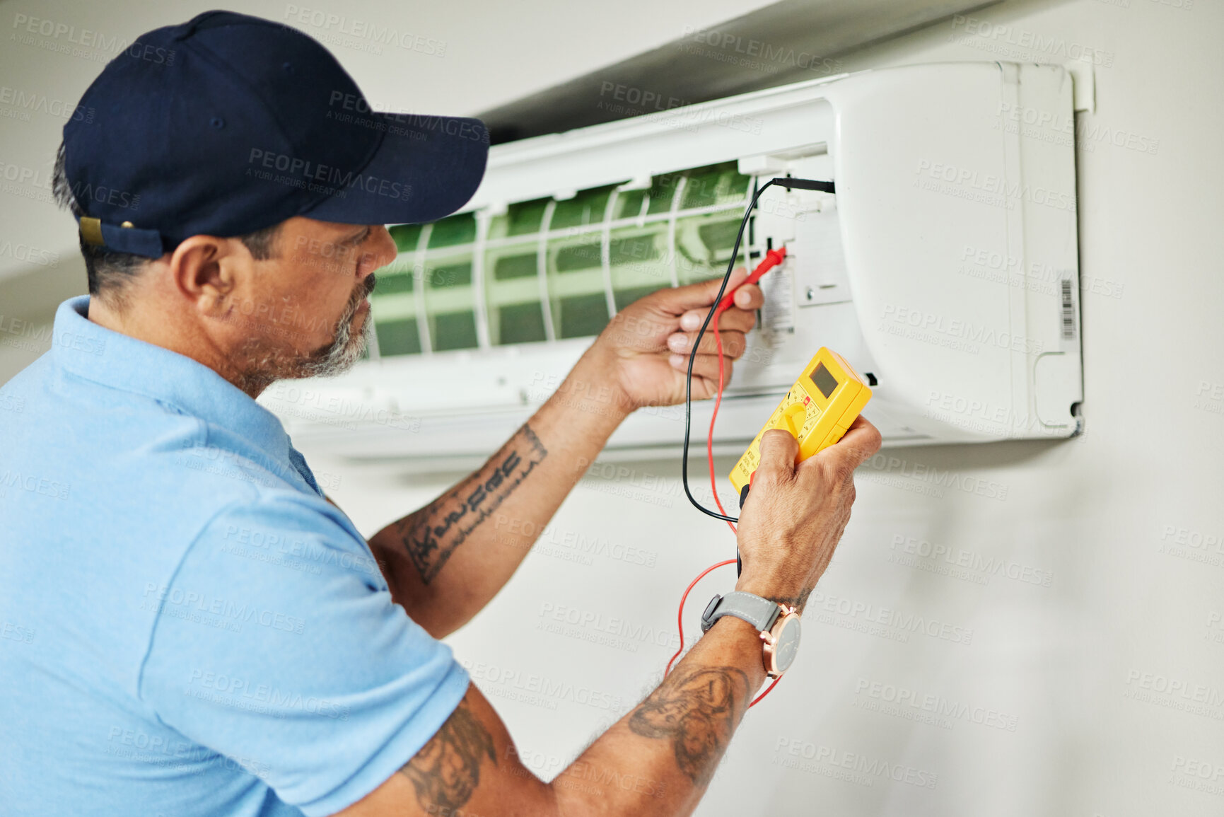 Buy stock photo Air conditioner, meter and electrician man for ac repair, maintenance and electrical power services on fan system. Person, technician or contractor with electricity, box check and hvac engineering