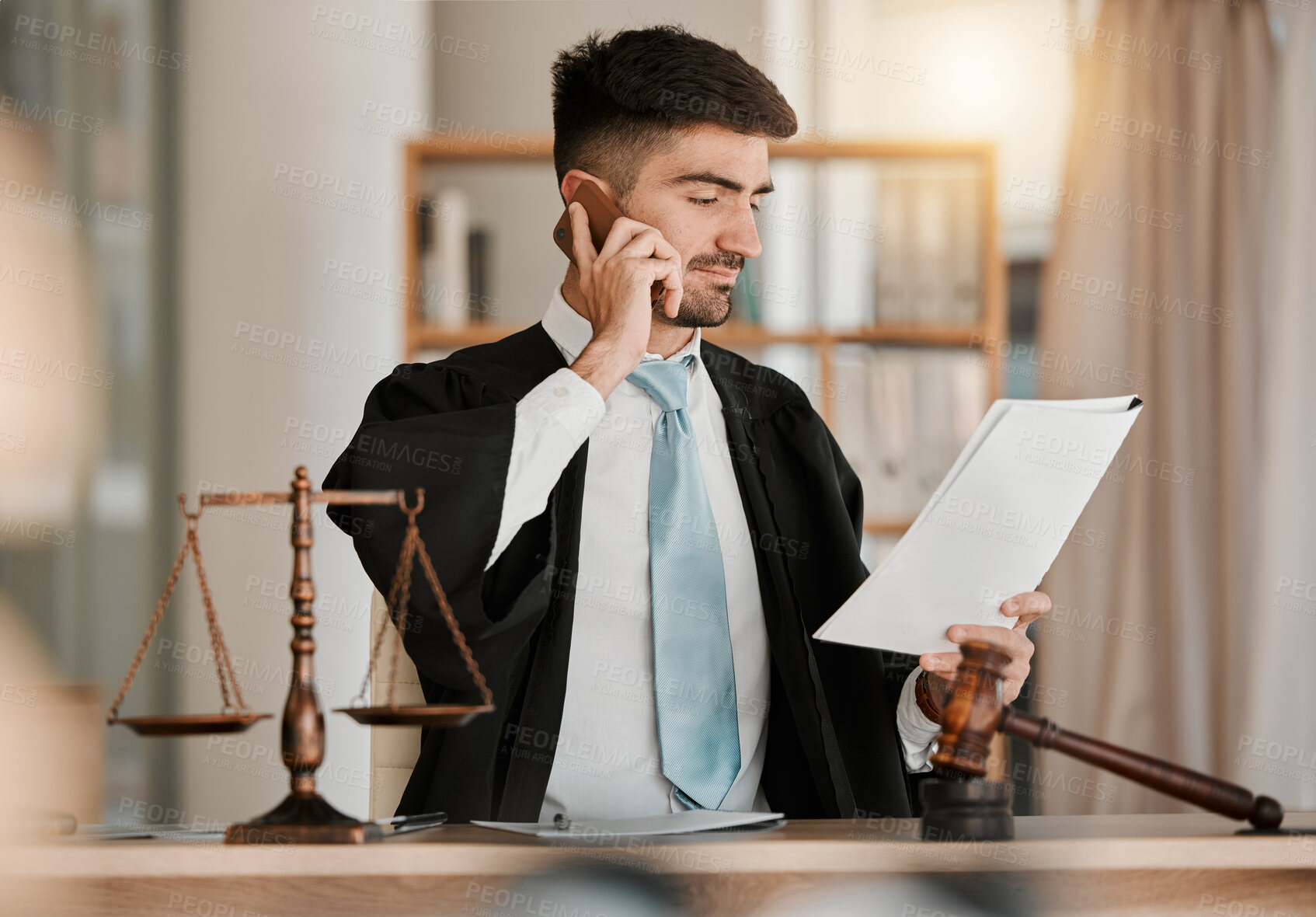 Buy stock photo Attorney man, scales and hammer with phone call, documents and reading with thinking for crime analysis. Advocate, lawyer or judge with legal research, paperwork and networking for court evidence