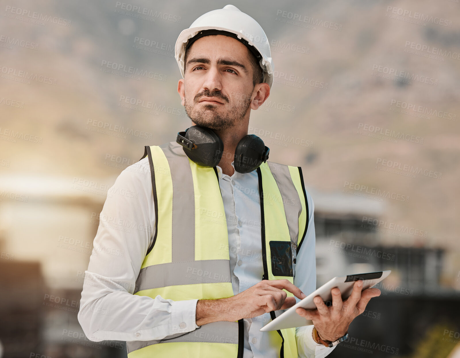 Buy stock photo Thinking, engineering and man at construction site with tablet for inspection, project management and architecture. Maintenance, online research and builder with digital checklist for expert safety.