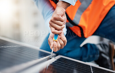 Buy stock photo Solar panels, tool and closeup of male engineer doing maintenance or repairs with screwdriver. Renovation, handyman and zoom of an industrial worker working on eco friendly construction on rooftop.