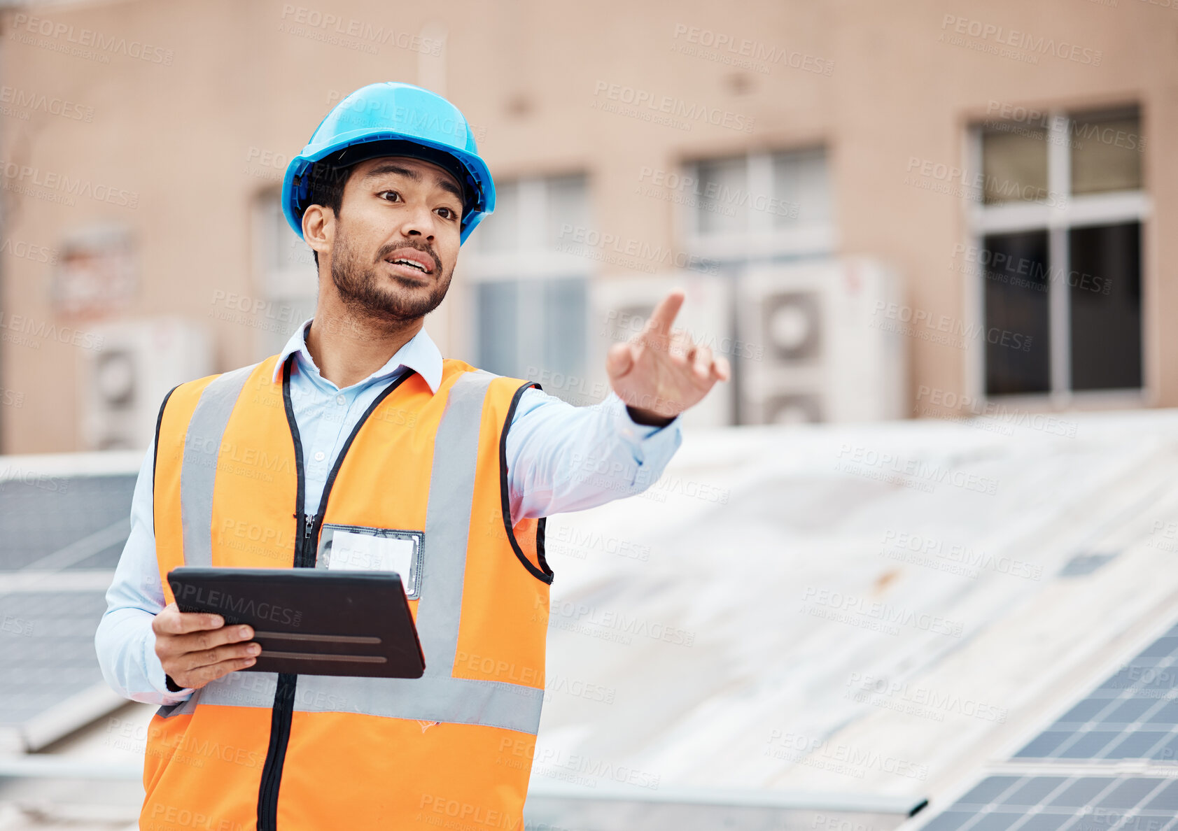 Buy stock photo Tablet, planning and male construction worker on a rooftop of a building for inspection or maintenance. Industry, engineering and young man foreman with digital technology working in an urban town.