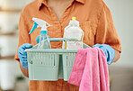 Hands of person with detergent basket for cleaning, housekeeping and disinfection of dirt, bacteria and dust. Closeup of cleaner, maid and container of chemical bottles, products and liquid tools 