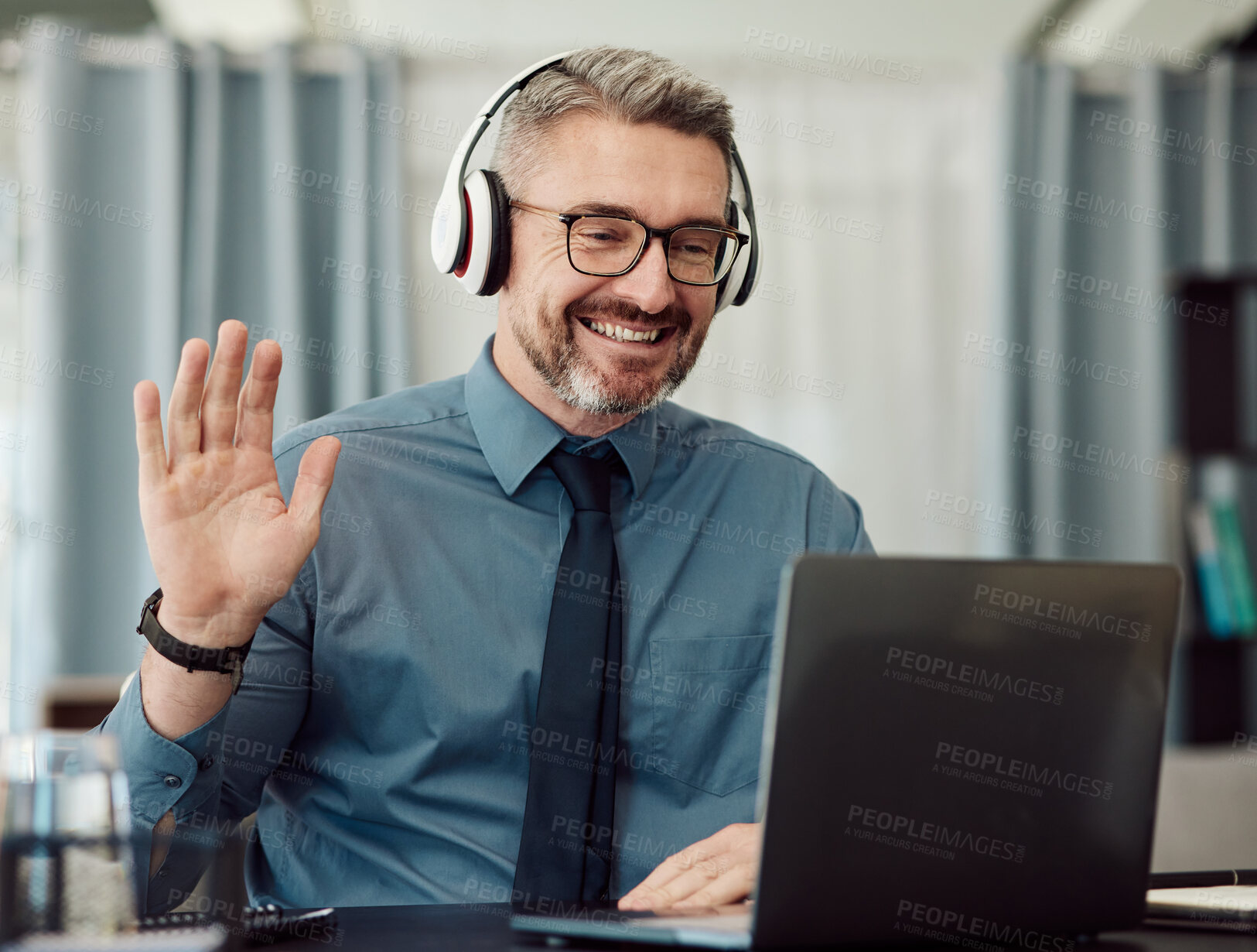 Buy stock photo Headphones, laptop and man wave on video call for business, smile and online chat at home. Happy, hello and webinar of mature manager with glasses in virtual meeting, communication and remote work