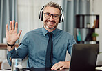 Portrait, headphones and man wave on video call for business smile in online chat at home. Happy face, hello and webinar of mature manager with glasses in virtual meeting for remote work on laptop