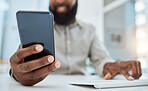 Business man, hands and typing on smartphone at computer in office for social network, mobile website and digital contact. Closeup of worker reading news, notification and app on cellphone at pc desk