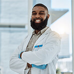 Black man, doctor and portrait with arms crossed in hospital for healthcare services, surgery and consulting in Nigeria. Happy surgeon, therapist and medical professional working with trust in clinic