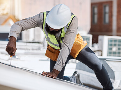 Buy stock photo African engineer man, screwdriver and solar energy on rooftop, maintenance and industry for thinking in city. Technician, builder and tools for photovoltaic tech, helmet and sustainability in metro