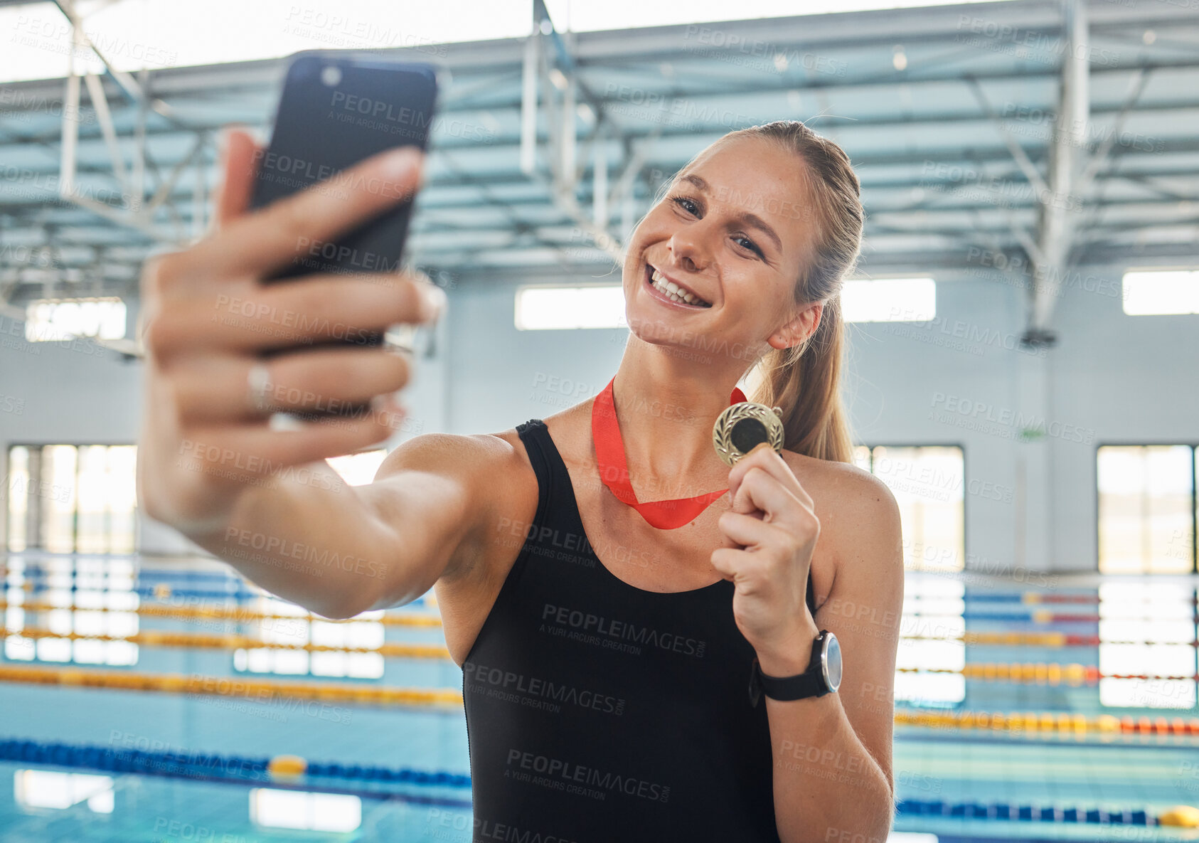 Buy stock photo Win selfie, woman and a medal for swimming, sports success and live streaming an achievement. Happy, gold and a professional swimmer taking a photo of an award or prize from water competition