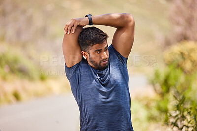 Buy stock photo Wellness, man or runner stretching arms on road in training, fitness workout or cardio exercise outdoors. Thinking body flexibility or healthy Indian male athlete in warm up to start running activity