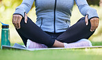 Yoga meditation, legs or nature person meditate for spiritual healing, chakra energy balance or park freedom. Closeup body, hands or zen yogi relax for mindfulness, mindset or wellness or grass field