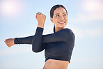 Happy woman, fitness and stretching arms for exercise, workout or outdoor running with sky background. Female person, athlete or runner smile thinking in wonder for body warm up or cardio training