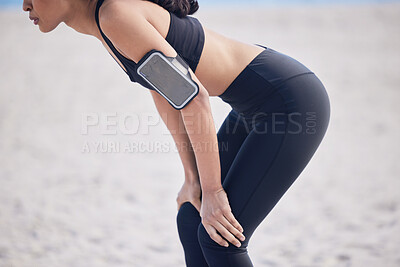 Buy stock photo Woman, fitness and break on beach after workout, running exercise or outdoor cardio training. Hands and body of fit, active and sporty female person in rest from intense exercising on the ocean coast