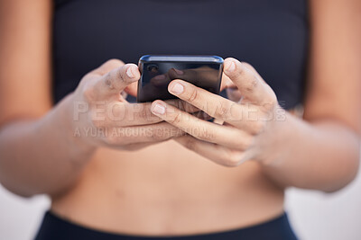 Buy stock photo Woman, phone and hands typing for fitness communication, social media or outdoor networking. Closeup of female person chatting or texting on mobile smartphone app for online browsing or research