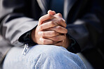 Hands together, clasped and woman with stress from mental health and wellness problem outdoor. Prayer, hope closeup and anxiety of a person feeling nervous and sad with grief, fear and worried 