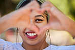 Heart hands, happy and portrait of woman in park for support, health and kindness symbol. Love, emoji and motivation with person and gesture in nature for empathy, trust and valentines day icon