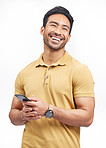 Happy, funny and Asian man with a smartphone, connection and social media on a white studio background. Person, network and model with a cellphone, mobile app and humor with a notification and email