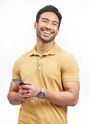 Buy stock photo Happy, funny and Asian man with a smartphone, connection and social media on a white studio background. Person, network and model with a cellphone, mobile app and humor with a notification and email