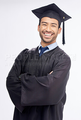Buy stock photo Student man, arms crossed and graduation in studio portrait, smile and success by white background. Young guy, happy university graduate and education achievement with pride, goals and celebration