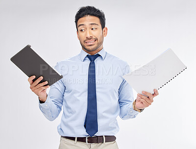 Buy stock photo Choice of print vs digital by businessman with paperwork for corporate work isolated in a studio white background. Tablet, decision and professional with document feeling confused and with question