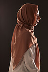 Muslim woman, profile and hijab in faith for religion, islam or praise against a dark studio background. Side view of Islamic female person or model with scarf in fashion for culture or tradition