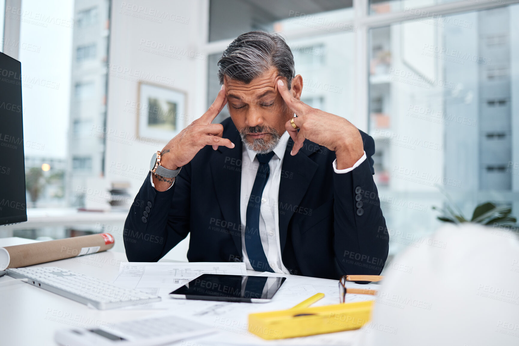 Buy stock photo Stress, tired and architect man in an office with a design problem, mistake or deadline for project. Mature male engineer frustrated with headache, fatigue or crisis in construction industry